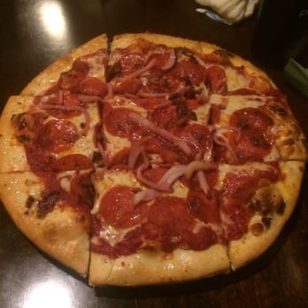 Crust 54 - The all meat pizza...minus Italian sausage. - Pizza Near Me - Holland, Michigan