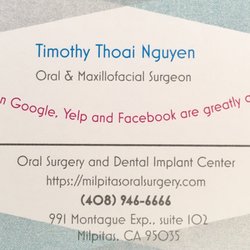 Oral Surgery and Dental Implant Center - Dr. Nguyen's business card