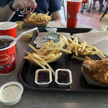Cosmic Ray's Starlight Café - Chicken Strips and French Fries - Sandwiches Near Me - Orlando, Florida Cosmic Ray's Starlight Café - Chicken Strips and French Fries - Sandwiches Near Me - Orlando, Florida