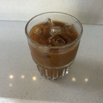Wyatt's Coffee - Iced Americano with Oat Milk - Coffee & Tea Near Me - Gainesville, Florida Wyatt's Coffee - Iced Americano with Oat Milk - Coffee & Tea Near Me - Gainesville, Florida