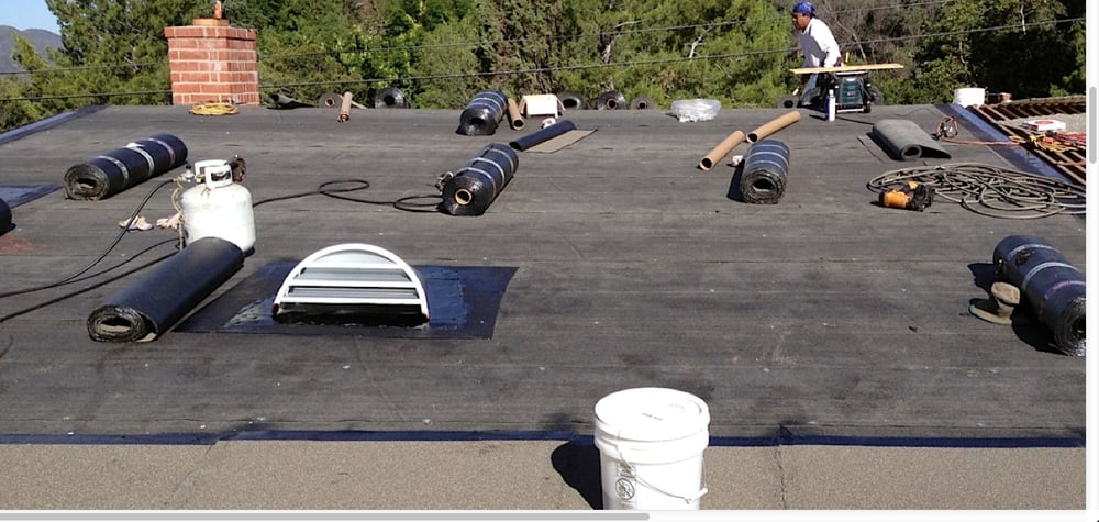 Slide of Roofing Contractors Inc