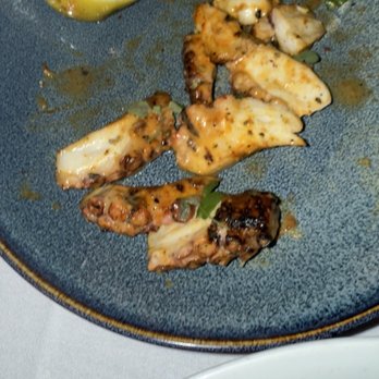 Cafe Santorini - Grilled octopus. In fairness, the portion of this was larger. I just forgot to take a picture before I ate some. - Italian Near Me - Pasadena, California Cafe Santorini - Grilled octopus. In fairness, the portion of this was larger. I just forgot to take a picture before I ate some. - Italian Near Me - Pasadena, California