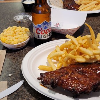 The Patio - Half slab of ribs dinner. french fries, mac and cheese dinner bread and a cold Coors light minus a cold glass. Ribs were very meaty - Barbeque Near Me - Darien, Illinois The Patio - Half slab of ribs dinner. french fries, mac and cheese dinner bread and a cold Coors light minus a cold glass. Ribs were very meaty - Barbeque Near Me - Darien, Illinois