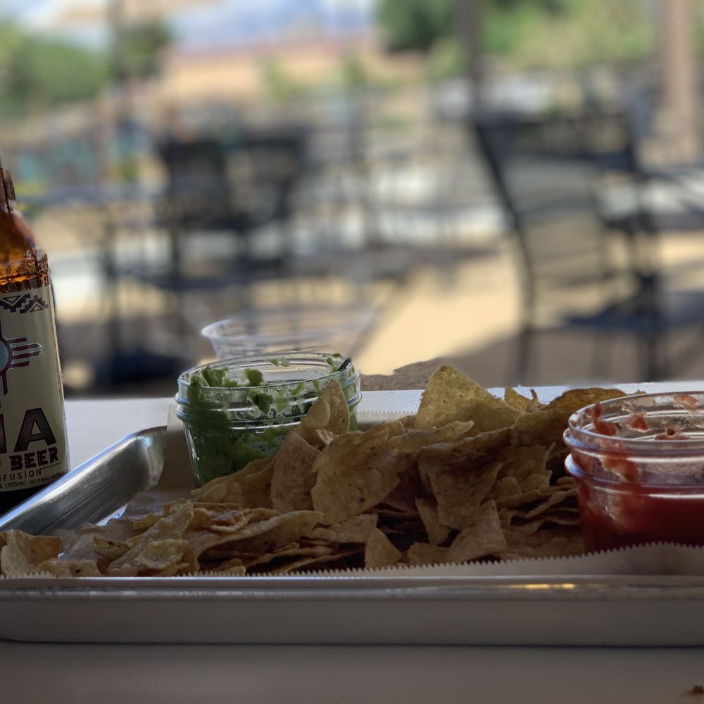 FARMesilla - Guac and salsa. Super yummy! All we could eat since it was overfilled mason jars! - Farmers Market Near Me - Mesilla, New Mexico