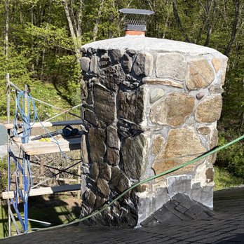 Lou's Stonework - stone chimney we repaired. stones were missing and one whole side had to be taken down and rebuilt. - Masonry/Concrete Near Me Lou's Stonework - stone chimney we repaired. stones were missing and one whole side had to be taken down and rebuilt. - Masonry/Concrete Near Me
