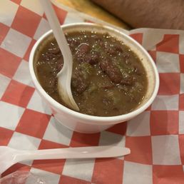 a bowl of soup with a spoon in it