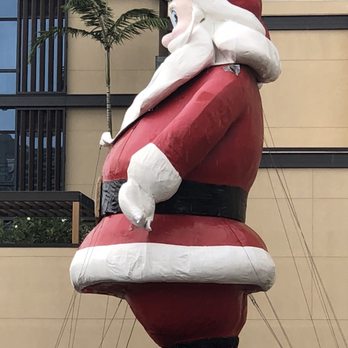 Ala Moana Center - Side view of the giant Ala Moana Santa that goes up every year. - Shopping Centers Near Me - Honolulu, Hawaii Ala Moana Center - Side view of the giant Ala Moana Santa that goes up every year. - Shopping Centers Near Me - Honolulu, Hawaii