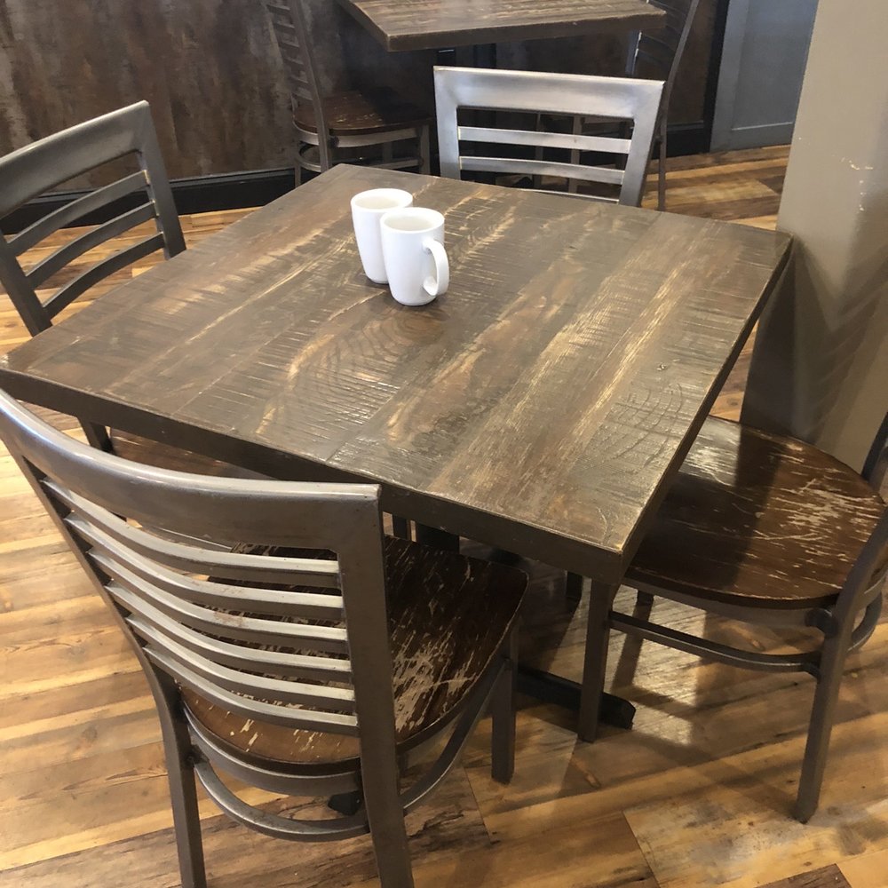First Watch - A table and chairs inside the restaurant. - Breakfast & Brunch Near Me - Hendersonville, Tennessee First Watch - A table and chairs inside the restaurant. - Breakfast & Brunch Near Me - Hendersonville, Tennessee