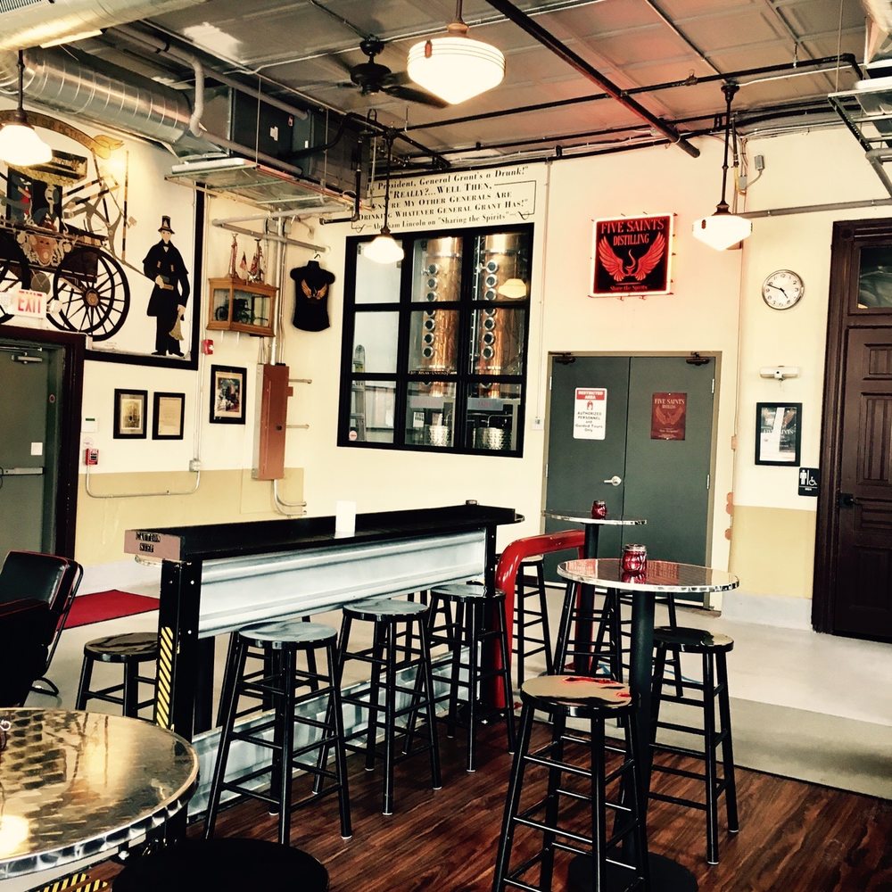 Five Saints Distilling - a bar with stools and tables - Distilleries Near Me - Norristown, Pennsylvania