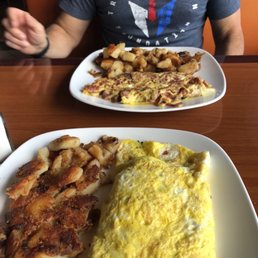 Overstuffed Florentine omelette and New York omelette. Overstuffed Florentine omelette and New York omelette.