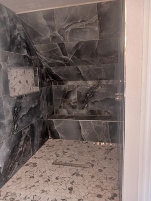 Ismael Ceramics and Porcelain Installations Logo