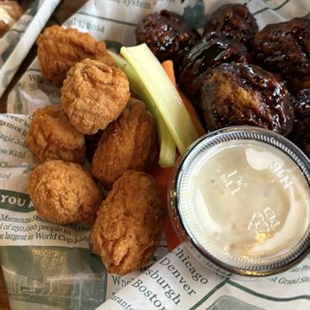The Spread Bar and Grill - Wings- old bay and sesame garlic - Beer Bar Near Me - Lindenhurst, New York The Spread Bar and Grill - Wings- old bay and sesame garlic - Beer Bar Near Me - Lindenhurst, New York