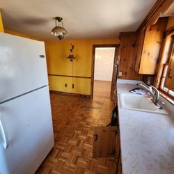 J & T Home Improvements - State of the 1950s kitchen when we purchased.