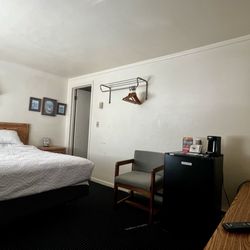 Functional, cozy room. Dated. Needs paining yet clean