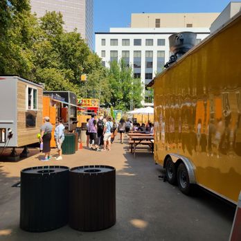 Midtown Beer Garden - food trucks parked in a parking lot - Beer, Wine & Spirits Near Me - Portland, Oregon