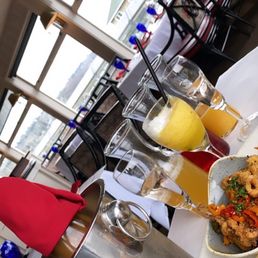 MIMOSA w. rose prosecco -- cranberry/pomegranate, orange, & pineapple juice MIMOSA w. rose prosecco -- cranberry/pomegranate, orange, & pineapple juice