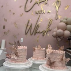 Cakes With A Whisk - Our cakes in front of their cute wall