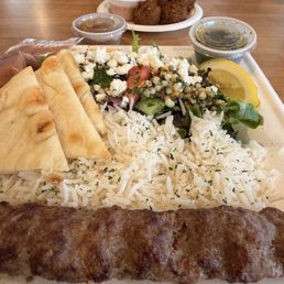 Plate with rice, Mediterranean salad, and Koobideh kabob & falafel!