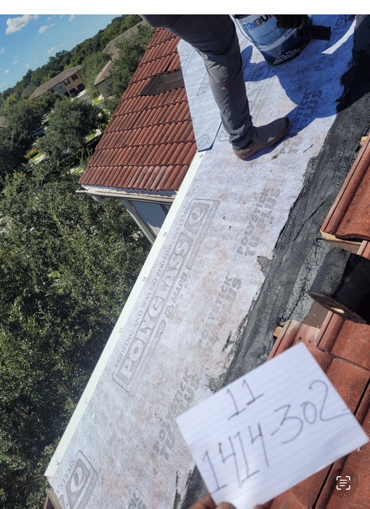 Slide of John Feeney Roofing