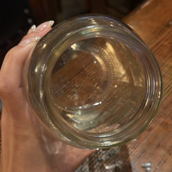 John Cutter - Dirty water inside the mason jar where your utensils are delivered in - New American Near Me - Las Vegas, Nevada