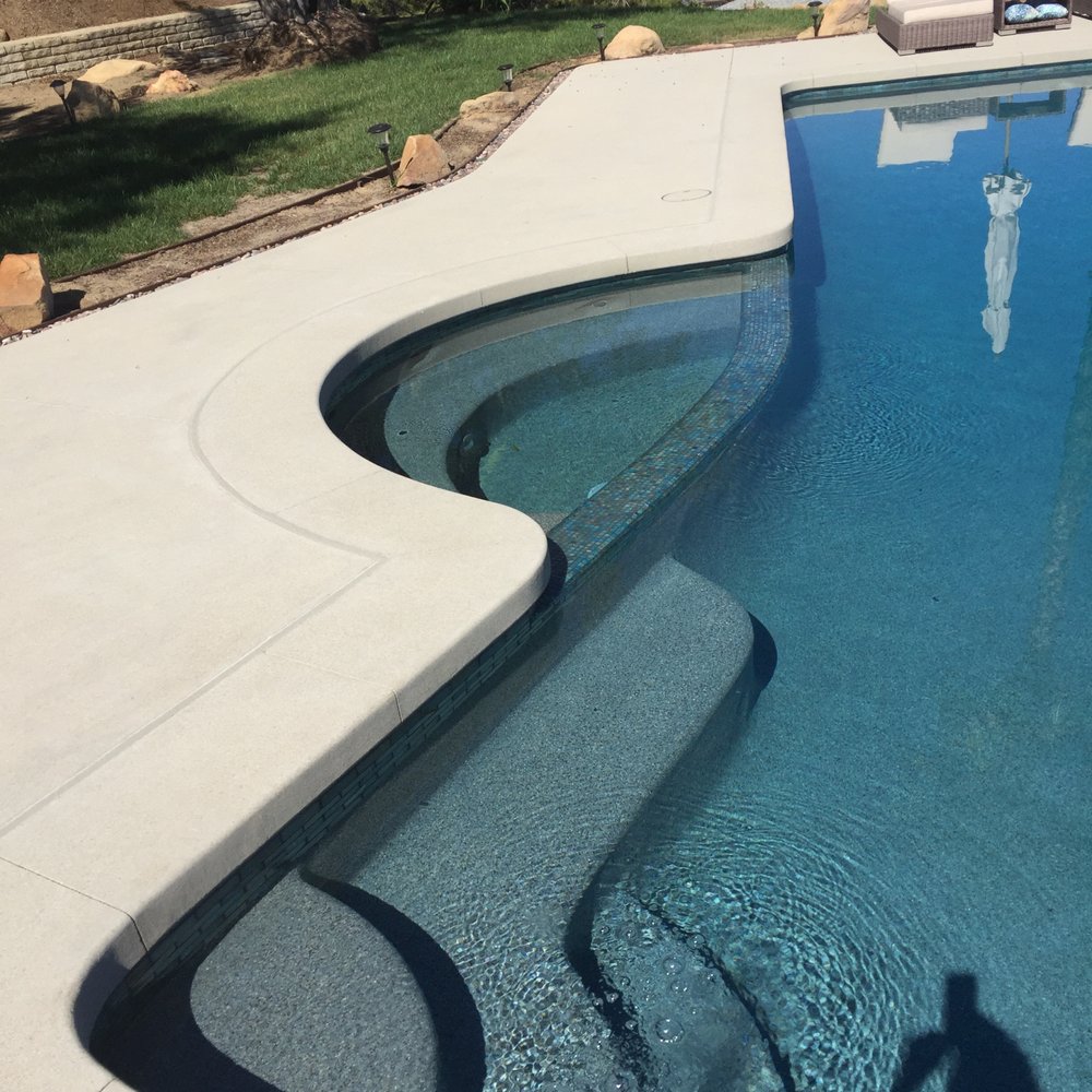 Sundancer Pools - View of overall concrete finish and pool stucco finish - Pool & Hot Tub Service Near Me - Escondido, California Sundancer Pools - View of overall concrete finish and pool stucco finish - Pool & Hot Tub Service Near Me - Escondido, California
