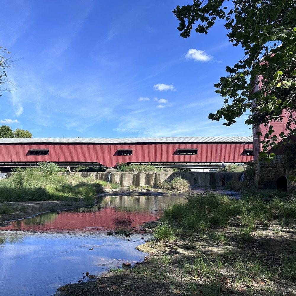 Bridgeton Mill - Covered bridge over waterfall at Bridgeton Mill. Bridgeton, Indiana. - Local Flavor Near Me - Bridgeton, Indiana Bridgeton Mill - Covered bridge over waterfall at Bridgeton Mill. Bridgeton, Indiana. - Local Flavor Near Me - Bridgeton, Indiana