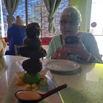 Yardie Spice - A tower of conch fritters with the spicy slaw. - Caribbean Near Me - Homestead, Florida Yardie Spice - A tower of conch fritters with the spicy slaw. - Caribbean Near Me - Homestead, Florida
