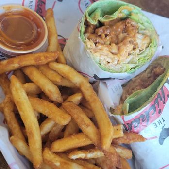 The Chicken Shanty - Crispy chicken wrap with chipotle sauce inside and voodoo sauce for the fries - Chicken Wings Near Me - Corvallis, Oregon