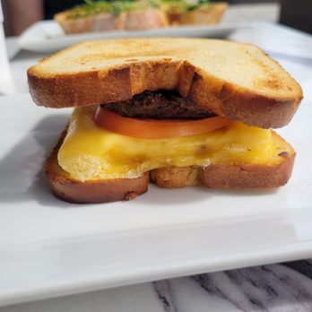 Coco Bistro & Bar - Classic Breakfast Sandwich on brioche bread - Coffee & Tea Near Me - Chapel Hill, North Carolina Coco Bistro & Bar - Classic Breakfast Sandwich on brioche bread - Coffee & Tea Near Me - Chapel Hill, North Carolina