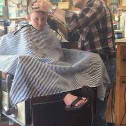 Butch's Barber Shop - Butch giving a haircut