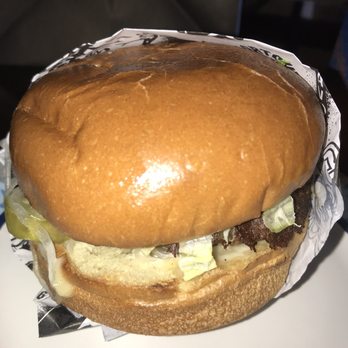 Guy Fieri's Flavortown Kitchen - Cheesy burger is good! Looks ugly tastes great - Food Delivery Services Near Me Guy Fieri's Flavortown Kitchen - Cheesy burger is good! Looks ugly tastes great - Food Delivery Services Near Me