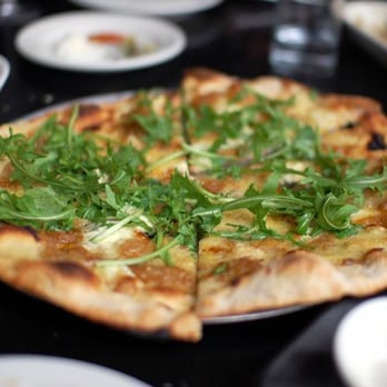 Gjelina - Gruyere, Caramelized Onion, Fromage Blanc & Arugula $13 - New American Near Me - Venice, California Gjelina - Gruyere, Caramelized Onion, Fromage Blanc & Arugula $13 - New American Near Me - Venice, California