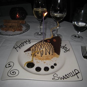 Acquerello - bourbon caramel semifreddo with amaretti crumbs and drizzle of chocolate sauce - Italian Near Me - San Francisco, California Acquerello - bourbon caramel semifreddo with amaretti crumbs and drizzle of chocolate sauce - Italian Near Me - San Francisco, California