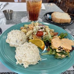 Martha's Tea Room - The plate contains chicken salads, pasta salad and a tossed salad. The plates come with fresh baked bread and butter.