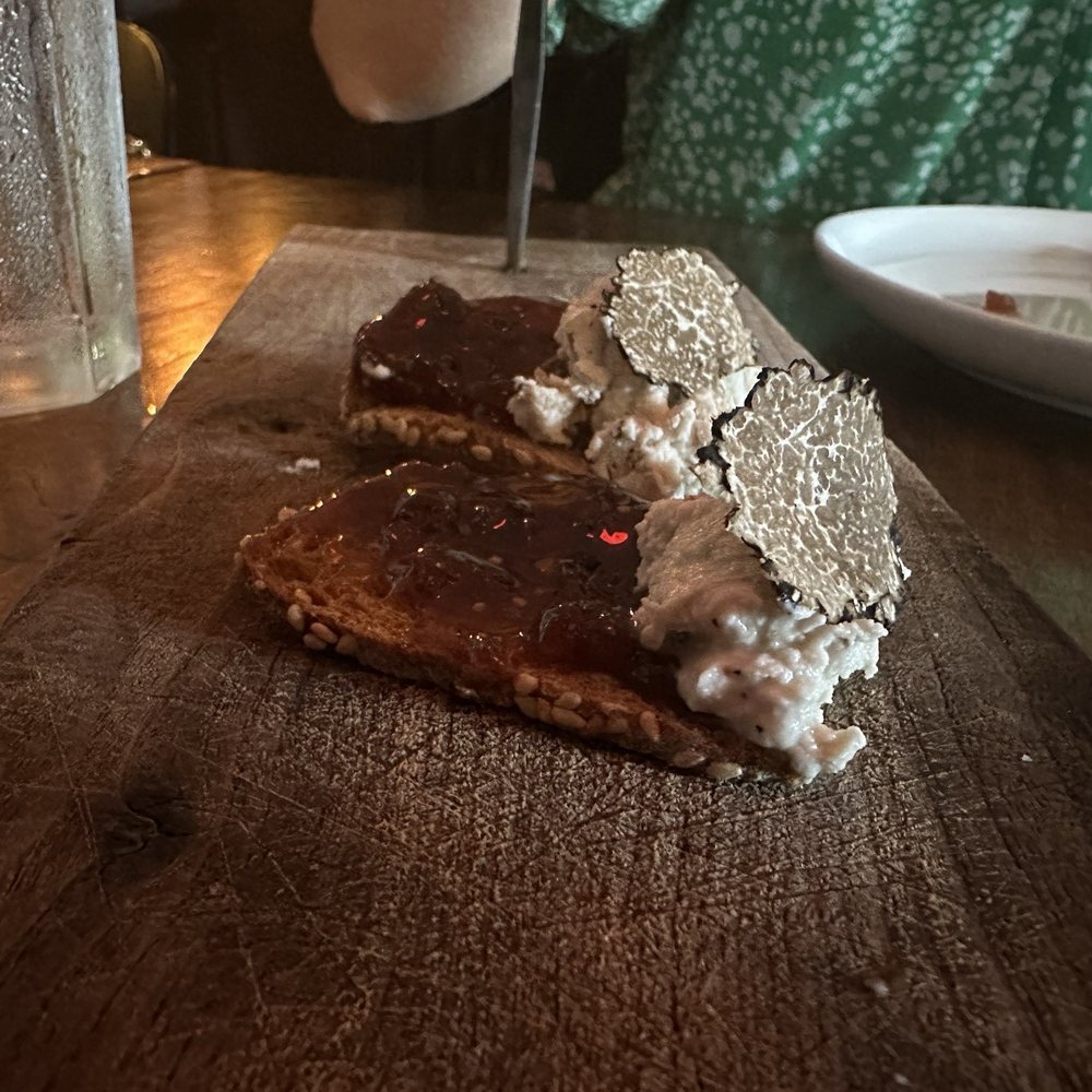 truffle honey bread with grated black truffles