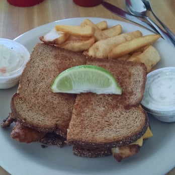 The Hideout Restaurant - Key Largo Fish Sandwich with fires. - American Near Me - Key Largo, Florida The Hideout Restaurant - Key Largo Fish Sandwich with fires. - American Near Me - Key Largo, Florida