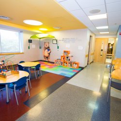 IWS Family Health - Medical clinic children's waiting area with reading nook.