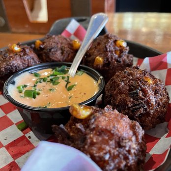 The Eagle Louisville - Hush puppies served with remoulade sauce. The corn kernels and jalapeño bits made it fantastic! A must  have!! - Southern Near Me - Louisville, Kentucky