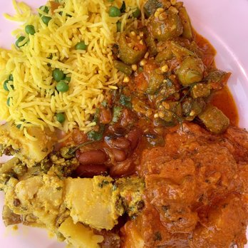 India Restaurant - Lunch buffet offering: Chicken tiki masala, okra, bean stew, warm potato salad, rice with peas - Indian Near Me - Providence, Rhode Island