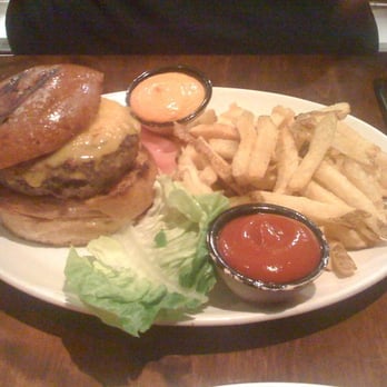 Nopa - Grass Fed Burger with Sharp Cheddar, Pickled Onions and French Fries - New American Near Me - San Francisco, California Nopa - Grass Fed Burger with Sharp Cheddar, Pickled Onions and French Fries - New American Near Me - San Francisco, California