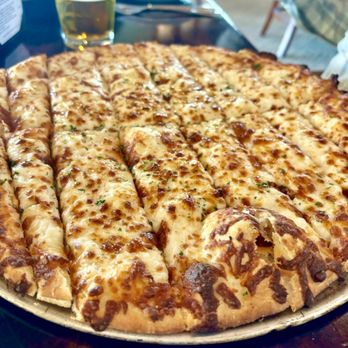 The Fish Rock Grille - Cheesy garlic bread with marinara dipping sauce - Seafood Near Me - Saint George, Utah