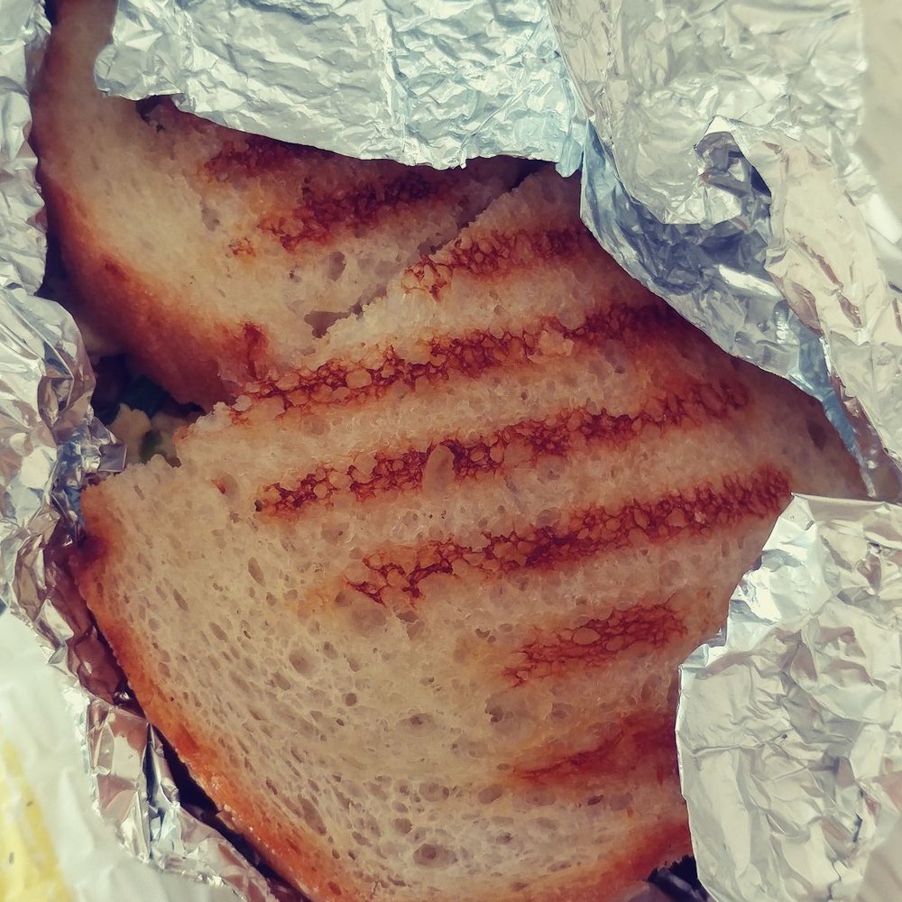 Corner Bakery Cafe - Why cant they bother to wrap my sandwich? I open my take out bag and my sandwich was just sitting in there like that. - Sandwiches Near Me - Lakewood, California