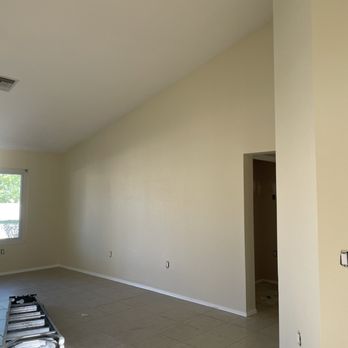 Vegas Paints - Living room in Antique White by Sherman Willams - Painters Near Me