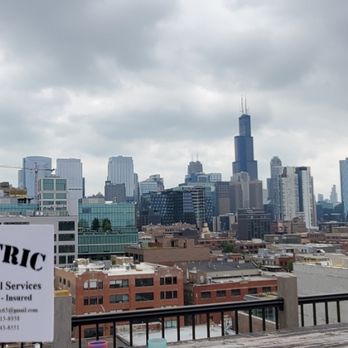 Bobo Electric - Working on the 6th floor on the roof patio of an penthouse - Electricians Near Me