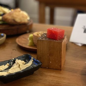 FLX Table - a plate of food and a glass of water - New American Near Me - Geneva, New York