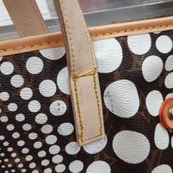 American Shoe Service - Genuine raw leather strap handle, close up