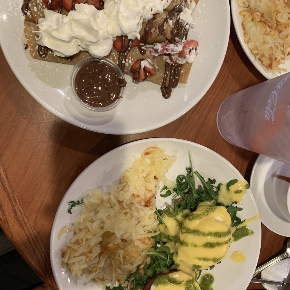 Broken Yolk Cafe - Eggs Benedict and Nutella crepe with strawberries - Breakfast & Brunch Near Me - Mesa, Arizona Broken Yolk Cafe - Eggs Benedict and Nutella crepe with strawberries - Breakfast & Brunch Near Me - Mesa, Arizona