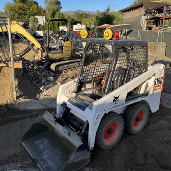 Alans Hauling & Tractor - Skid steer at work - Excavation Services Near Me Alans Hauling & Tractor - Skid steer at work - Excavation Services Near Me