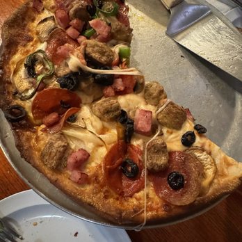 Pizza Luna - Combo Pizza Small. Nice to split for two. Sorry for the half eaten photo. - Pizza Near Me - New Orleans, Louisiana Pizza Luna - Combo Pizza Small. Nice to split for two. Sorry for the half eaten photo. - Pizza Near Me - New Orleans, Louisiana