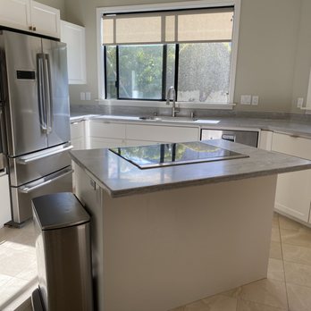 KB Remodeling - "AFTER" pic 2 - (new counters  with almost no grout lines; new cabinets; new appliances; new sink and fixtures) - General Contractors Near Me - Waipahu, Hawaii